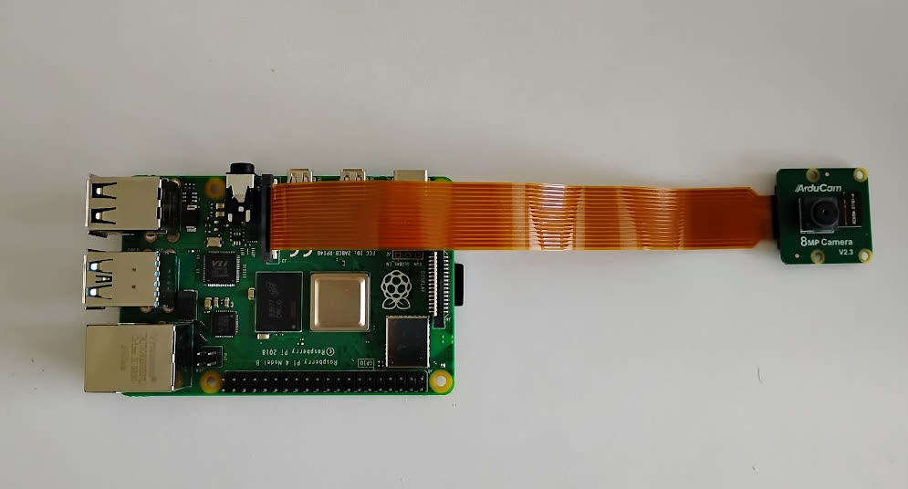 Raspberry Pi 4B connected to an ArduCam 8MP camera with a ribbon cable