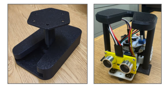 3D-printed UGV mount next to a small wheeled robot wearing the mount